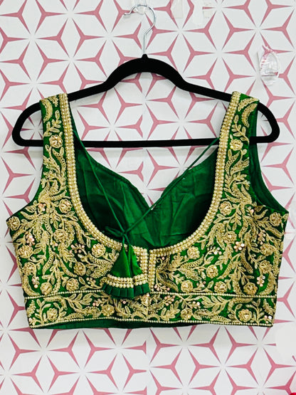 Green blouse with gold embroidery