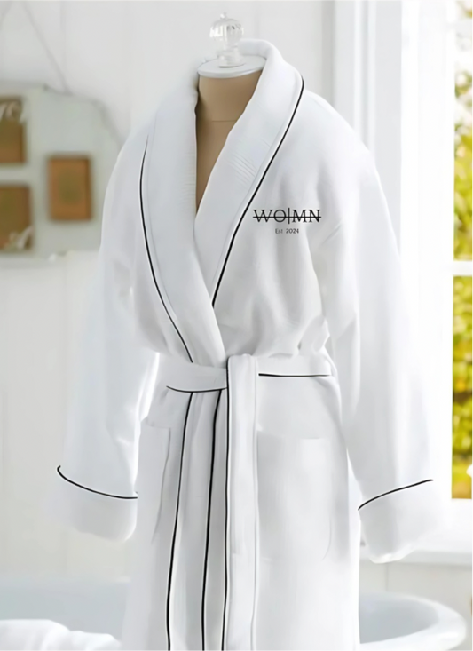 WO|MN embroidered logo 100% cotton waffle weave robe with black piping trim and two pockets - white