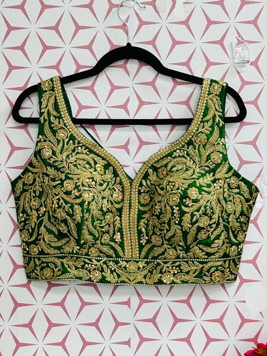 Green blouse with gold embroidery